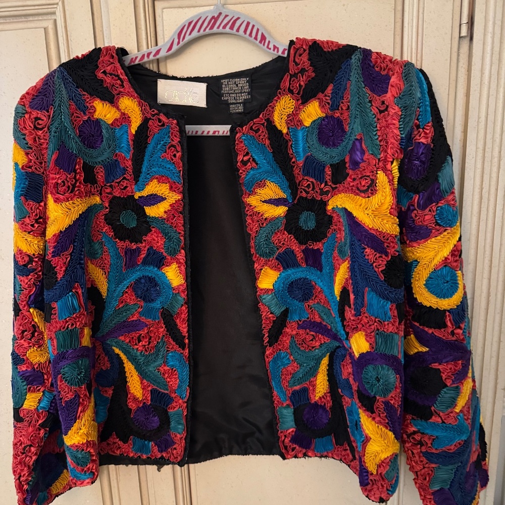 Very unique ribbon jacket by Cache sz med-large.